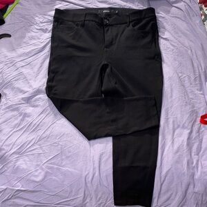 Torrid bombshell skinny black pants in 16R, not worn due but damage back pocket